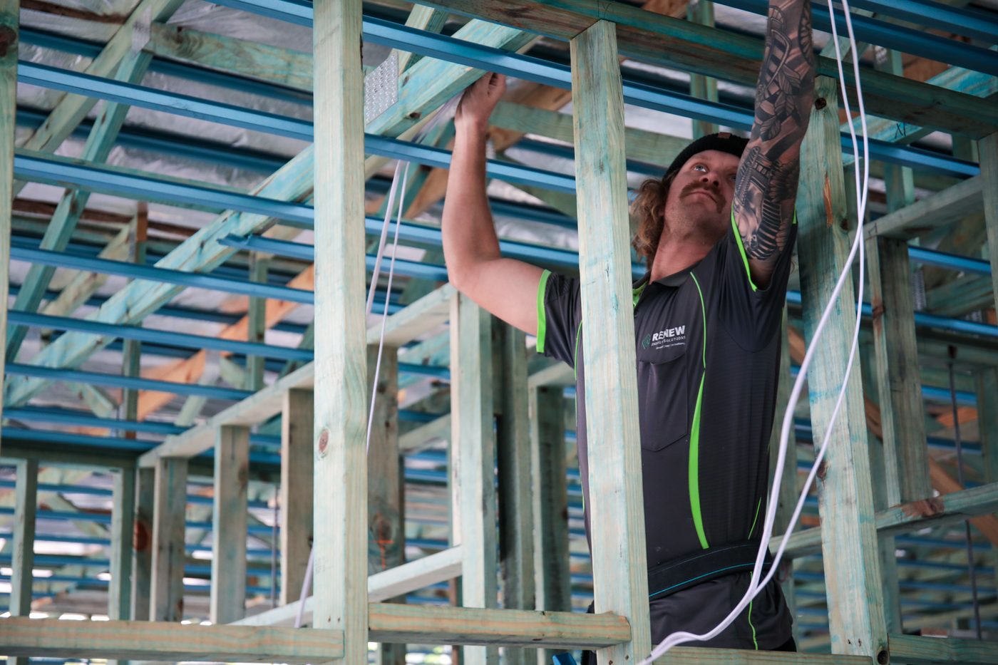Renew electrician wiring a ceiling frame