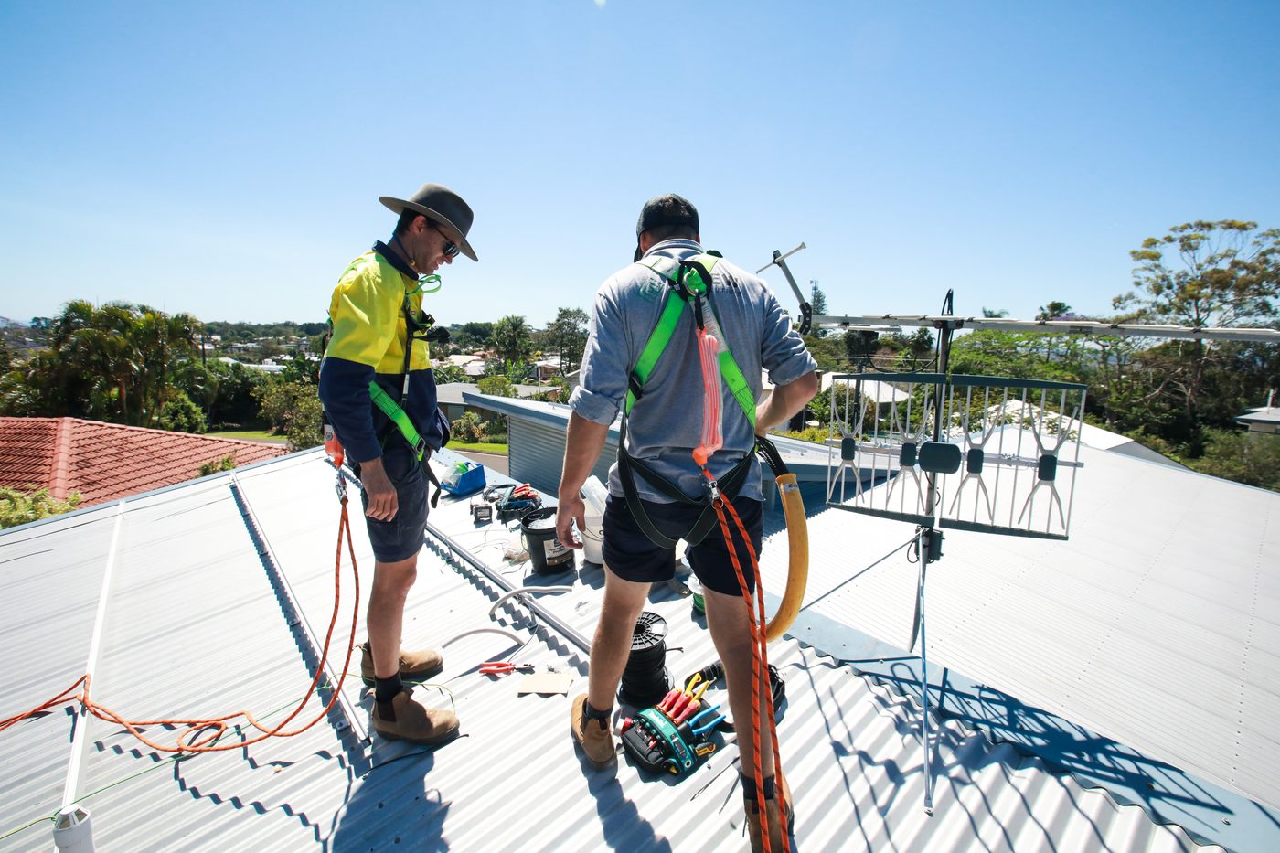 Renew team working on a roof